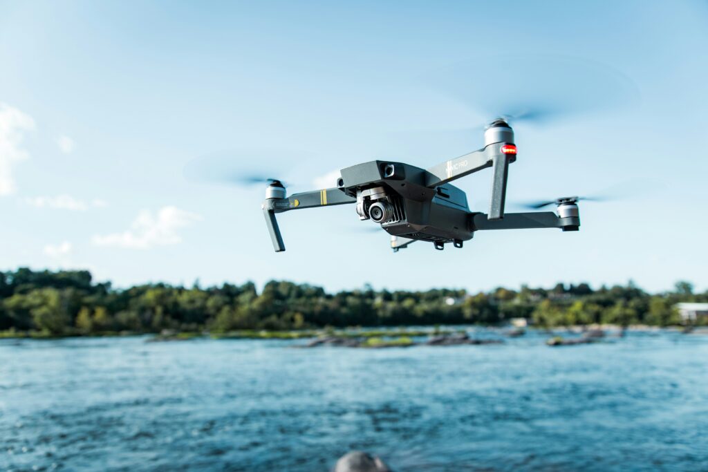 Drone flying over a river.